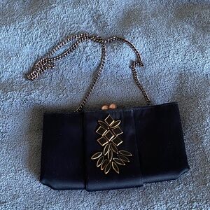 Menbur Black Clutch with Gold Detailing